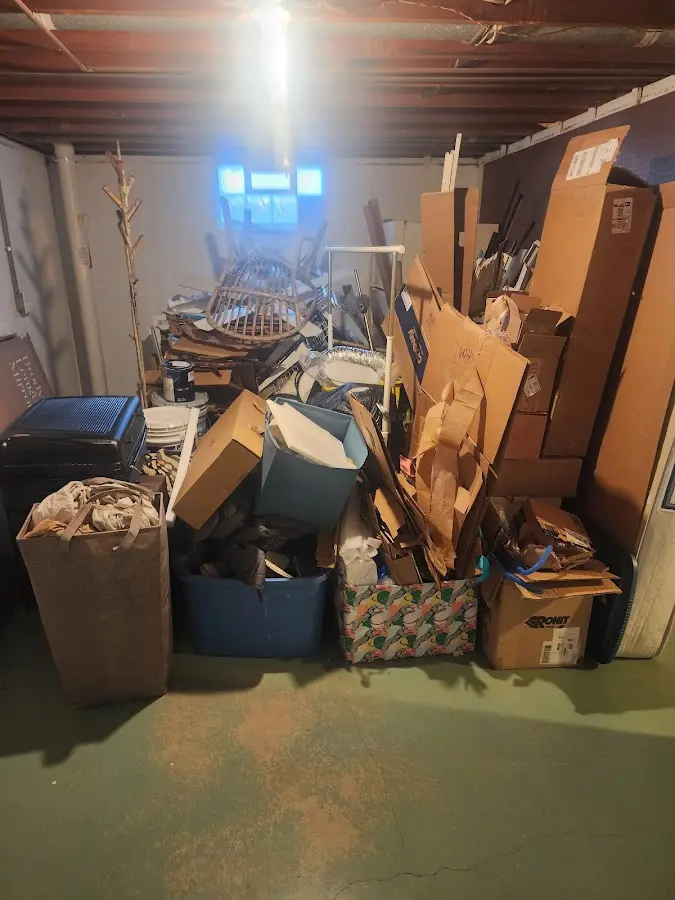 Roll-off dumpster container at job site for 6 Yard Dumpster Rental in Westerly